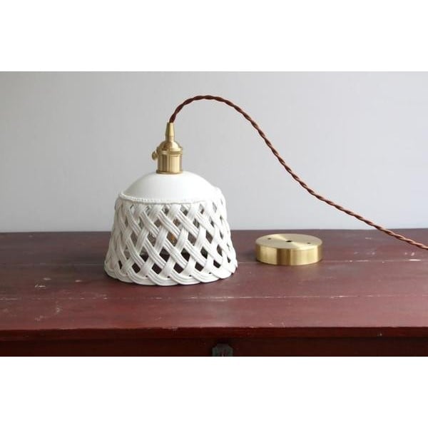 Openwork ceramic lamp