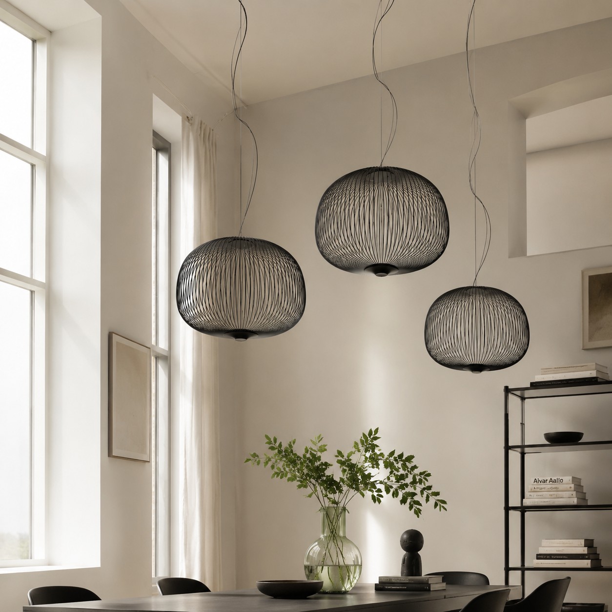 Modern radial pendant above a dining table