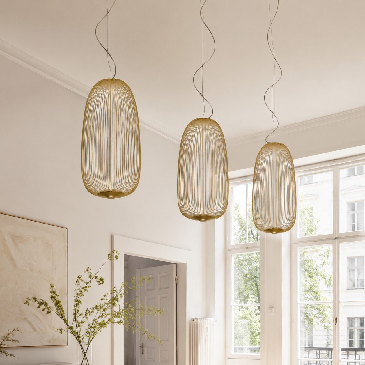 Birdcage-inspired pendant light in a styled interior