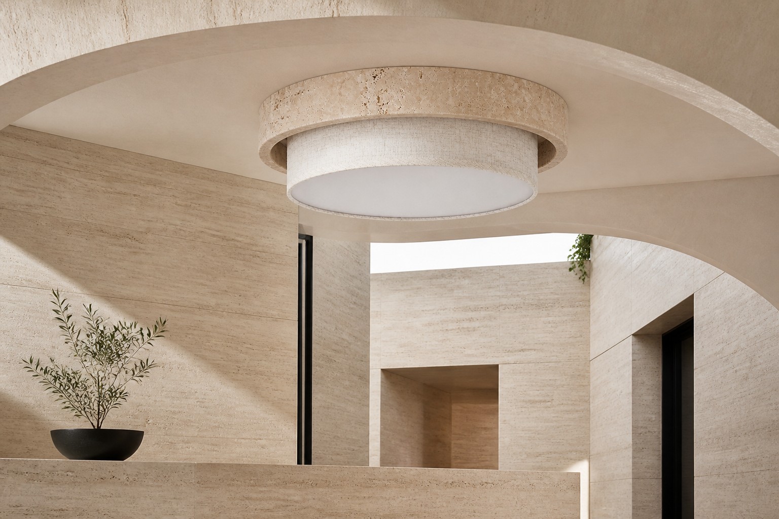 Travertine fabric flush mount ceiling light beneath a curved ceiling