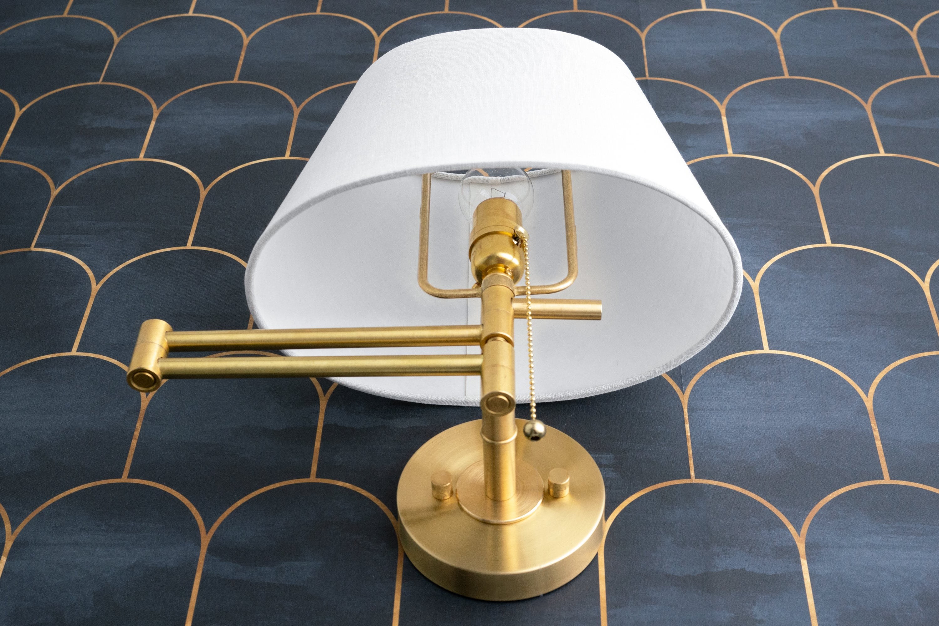 Ornato Luxe Brass Schoolhouse Sconce - Art Deco Wall Light with White Fabric Shade K1523