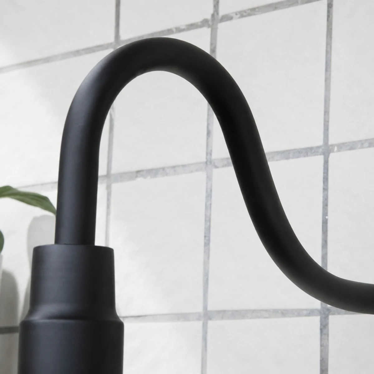 Matte black gooseneck arm and socket detail