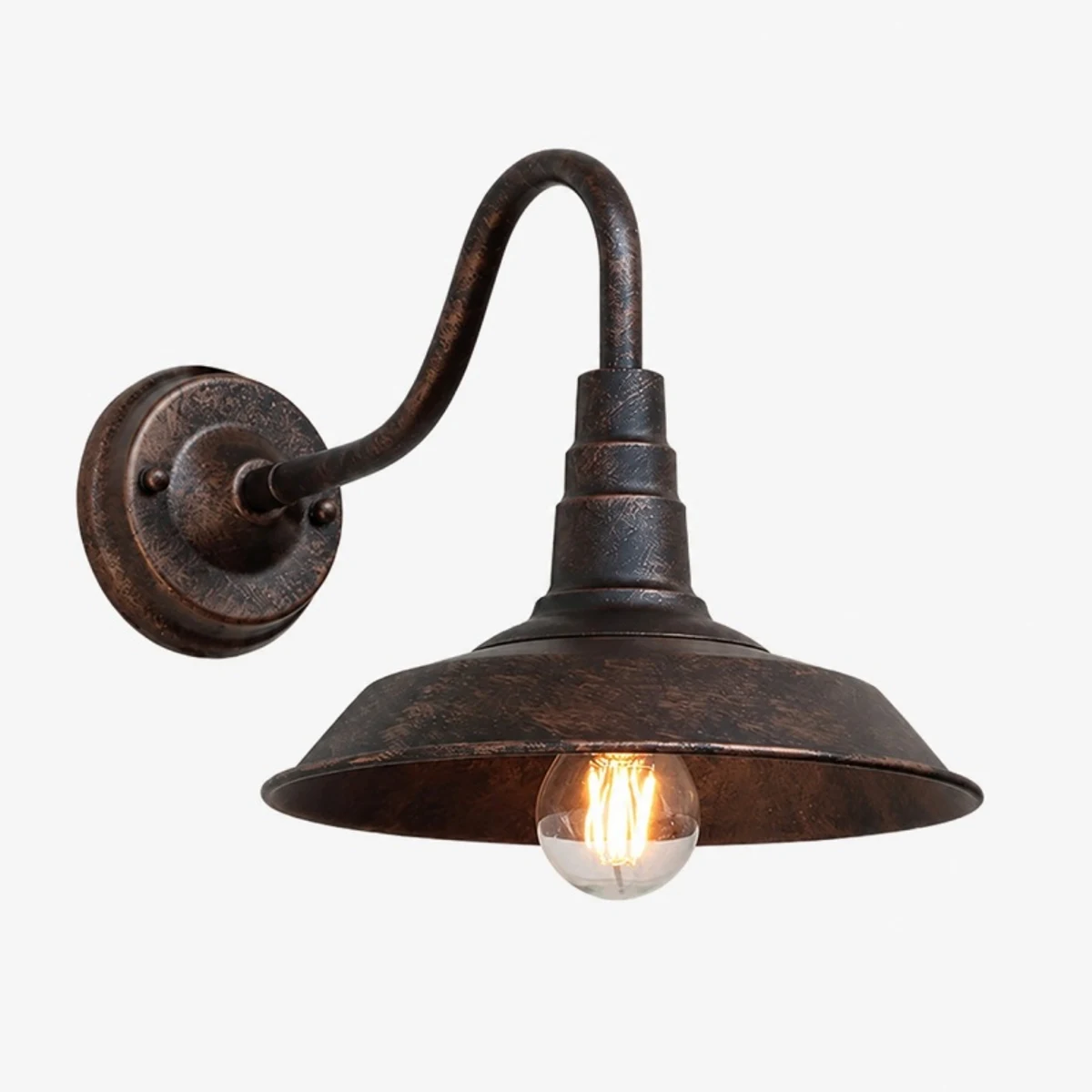 Antique bronze wall sconce with rustic shade