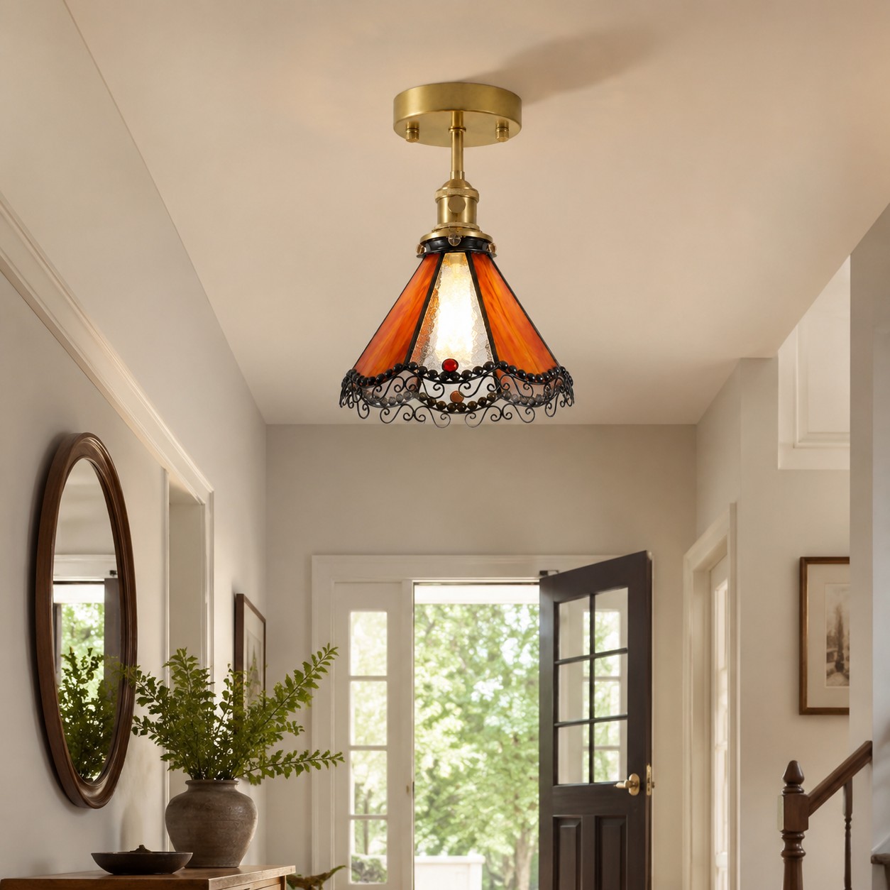 Orange stained glass ceiling light in a hallway
