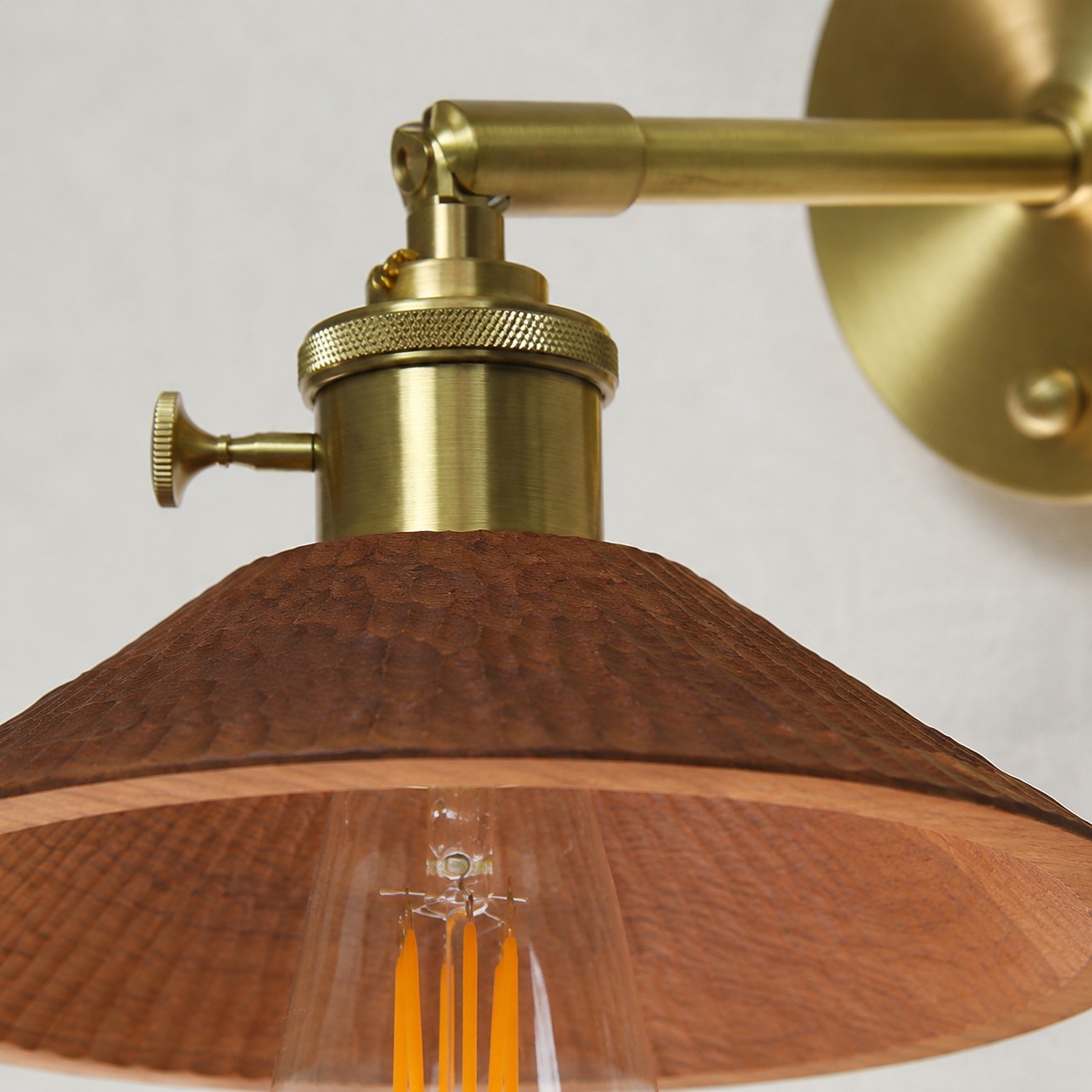Brass E27 socket and carved wood shade connection detail