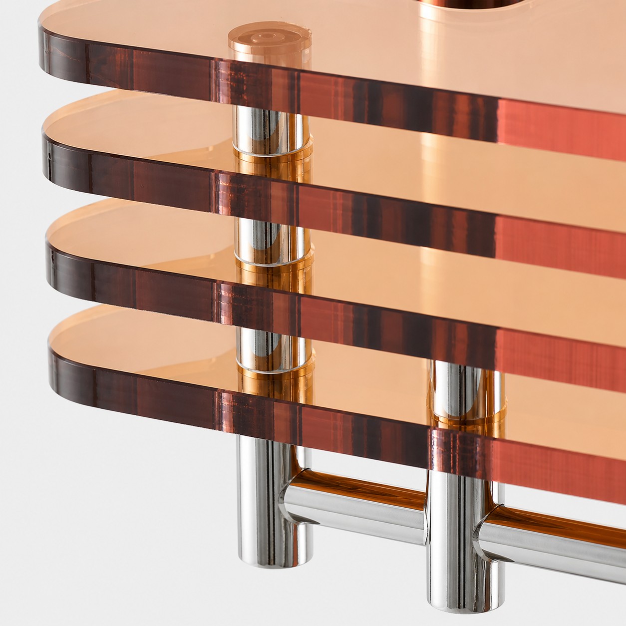 Amber acrylic edge and chrome support detail of Bauhaus wall sconce