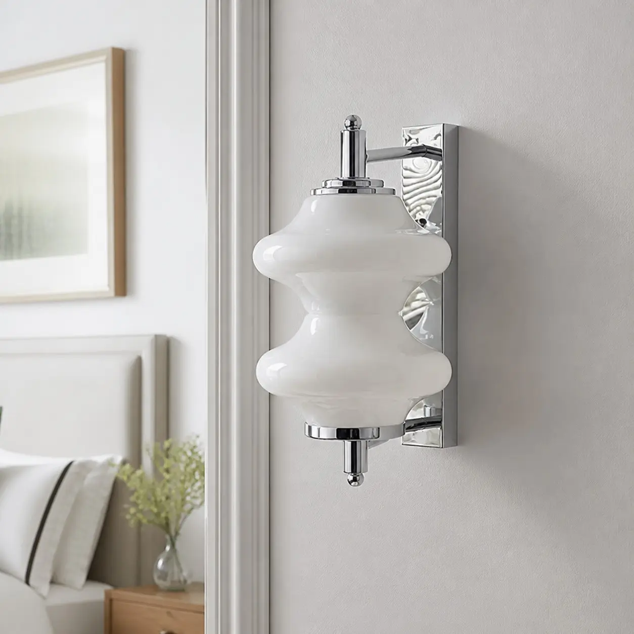 White glass wall light installed in a hallway