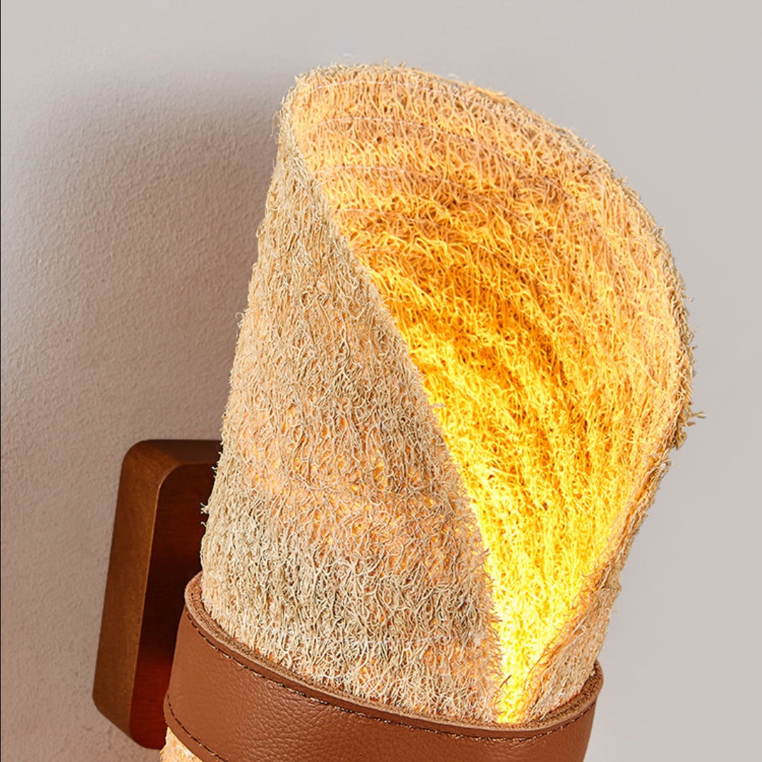 Close view of warm light glowing through natural loofah fibers