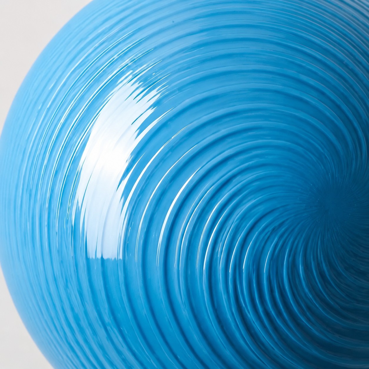 Close-up of the blue ribbed glass surface