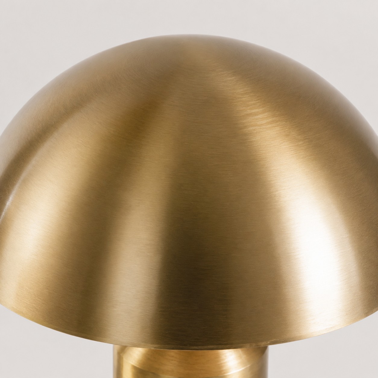 Close view of the brushed golden metal texture
