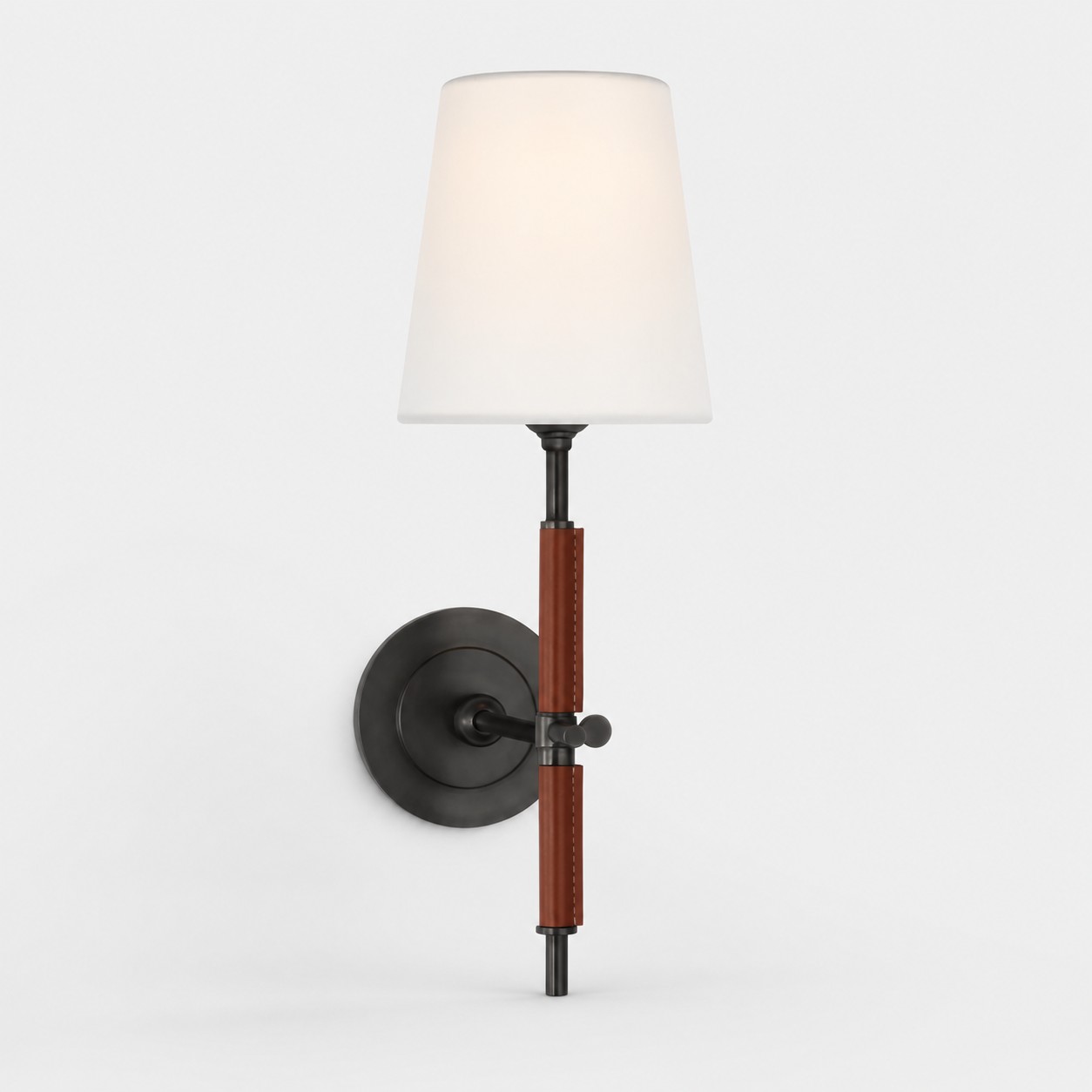 matte black wall sconce with brown leather and white fabric shade