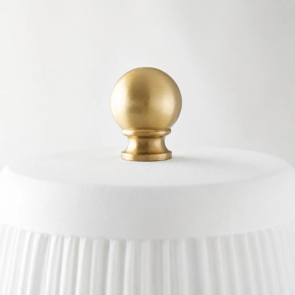 Close-up of the brass finial and shade top