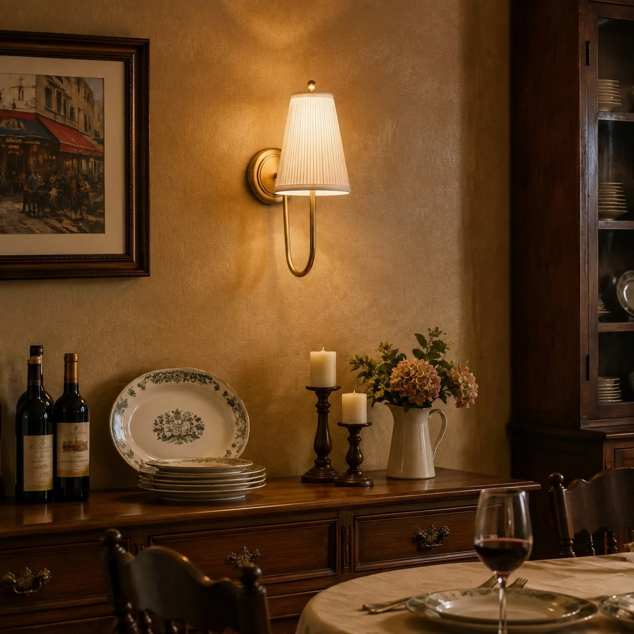 Vintage-inspired brass fabric wall sconce in a dining room