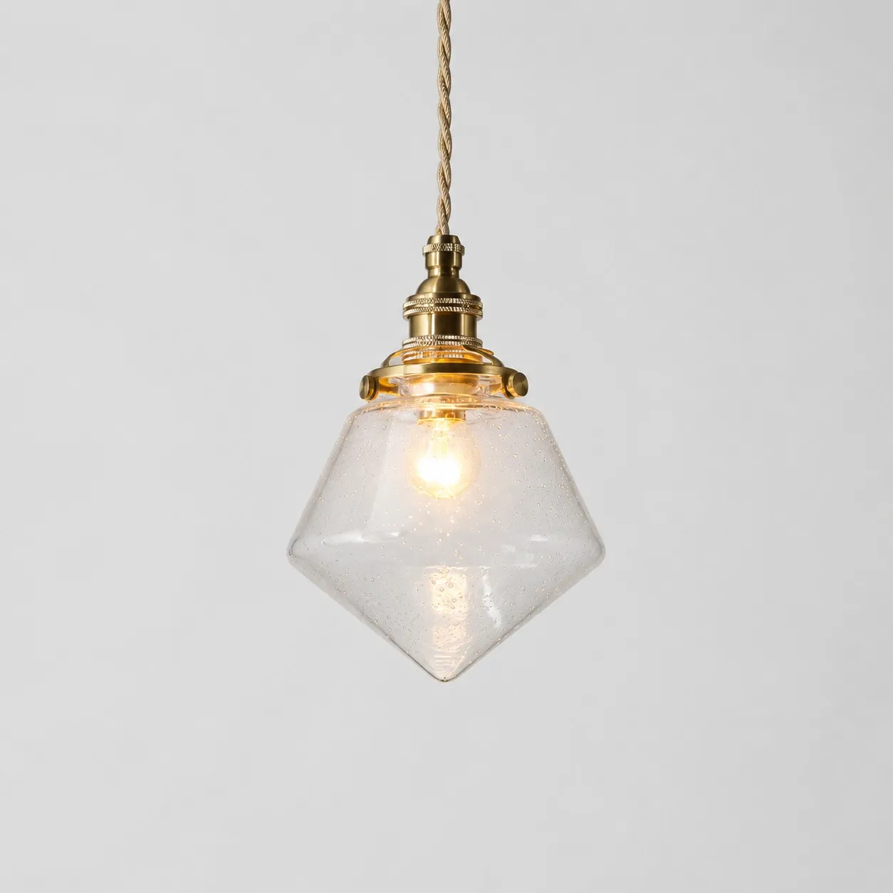 Bubble glass pendant with clear shade and warm canopy