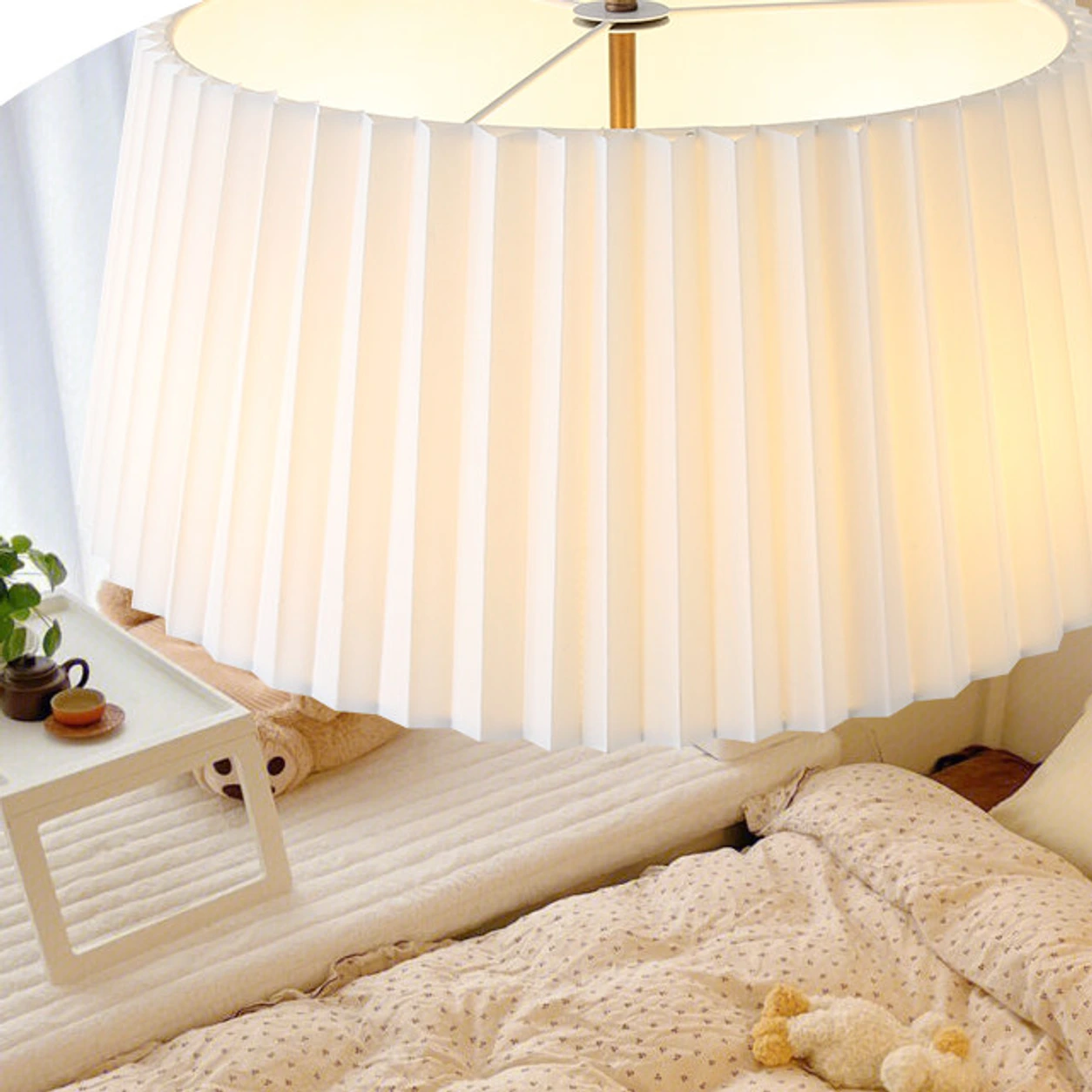 Tela chandelier shown at bedroom scale